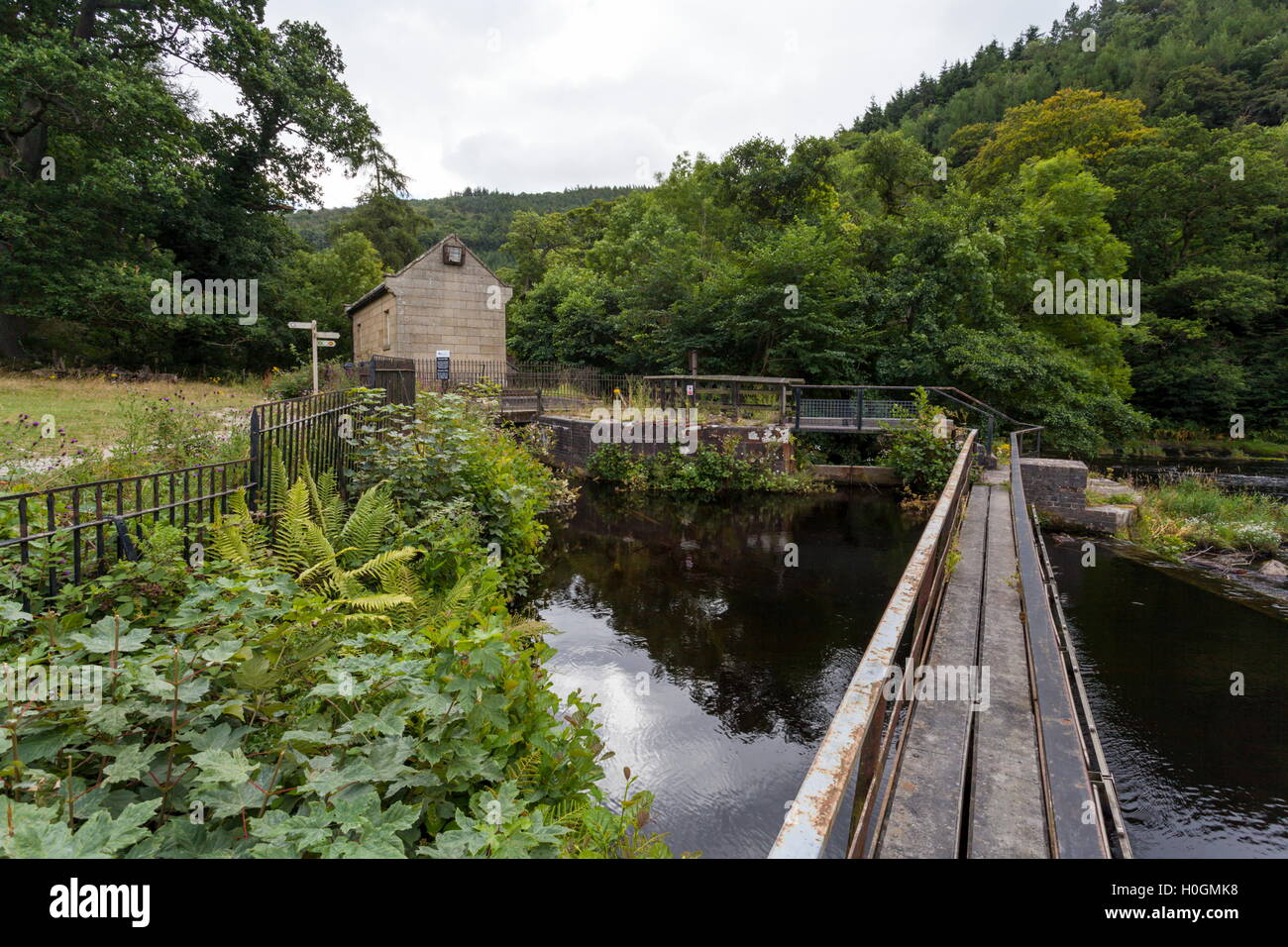 The Valve House on the Llangollen Canal which controls the water from the river Dee into the canal feeder Stock Photo