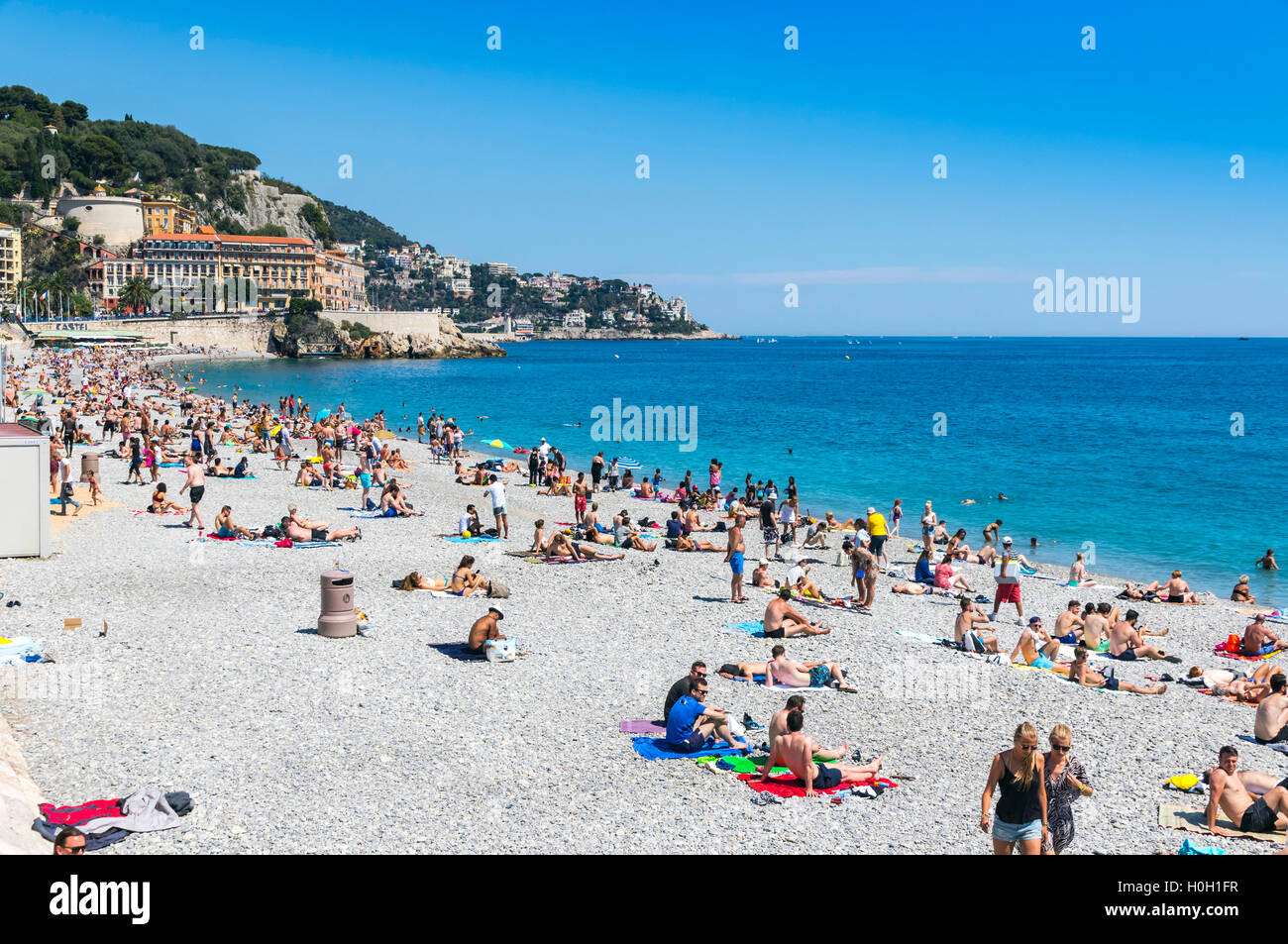 Municipal beach near Promenade des Anglais in City of Nice, Cote D'azur, Mediterranean sea, France Stock Photo