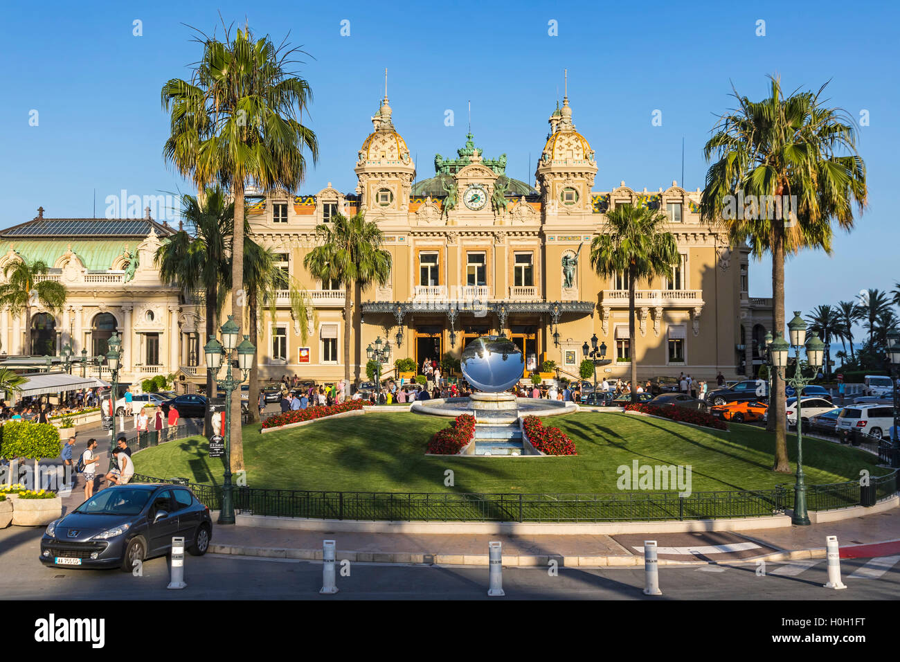 People gathering in front of the world famous Casino of Monte Carlo, Principality of Monaco Stock Photo