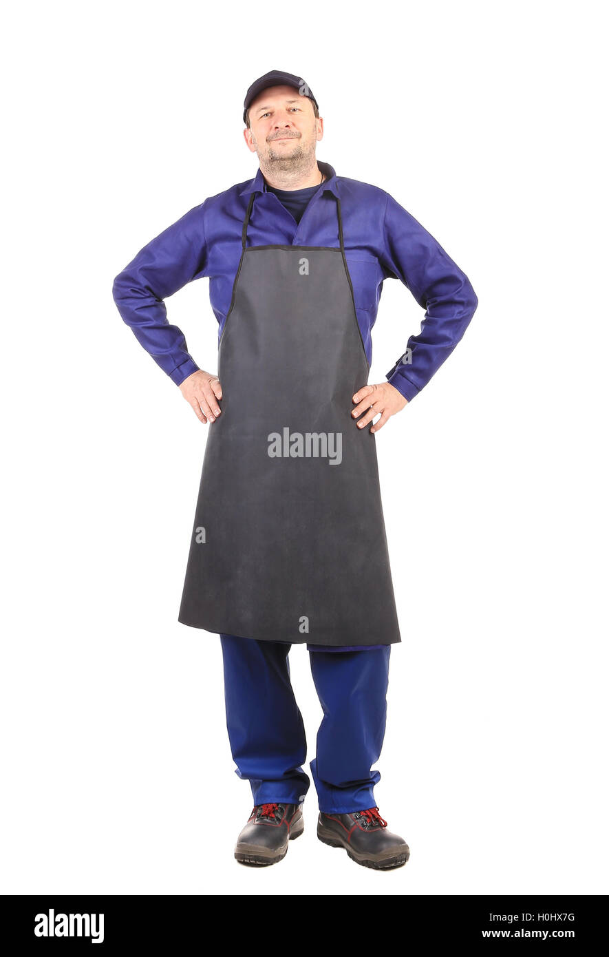 Worker wearing black apron Stock Photo - Alamy
