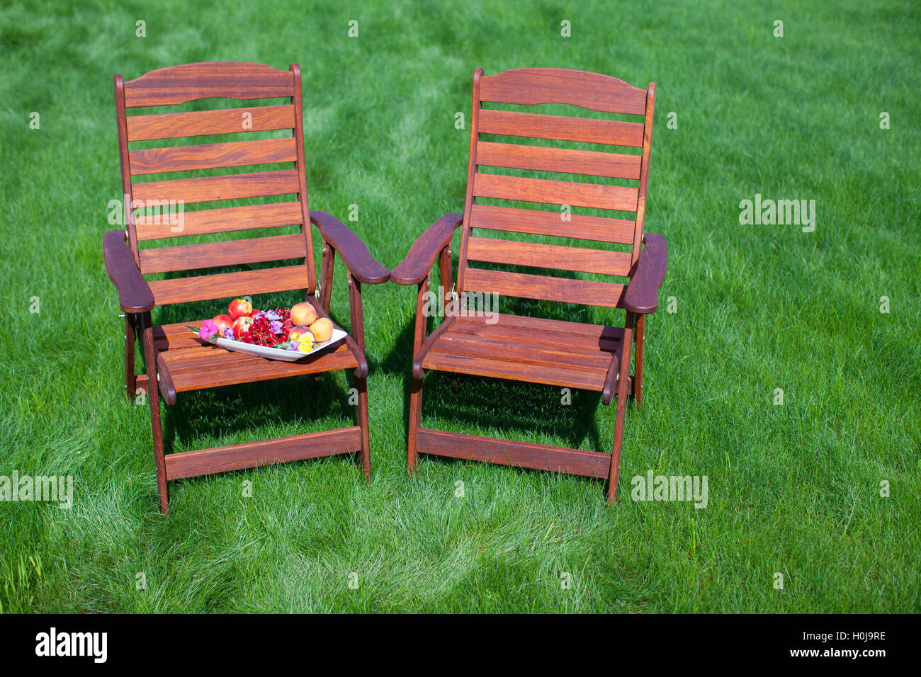 Two red garden chairs hi-res stock photography and images - Alamy