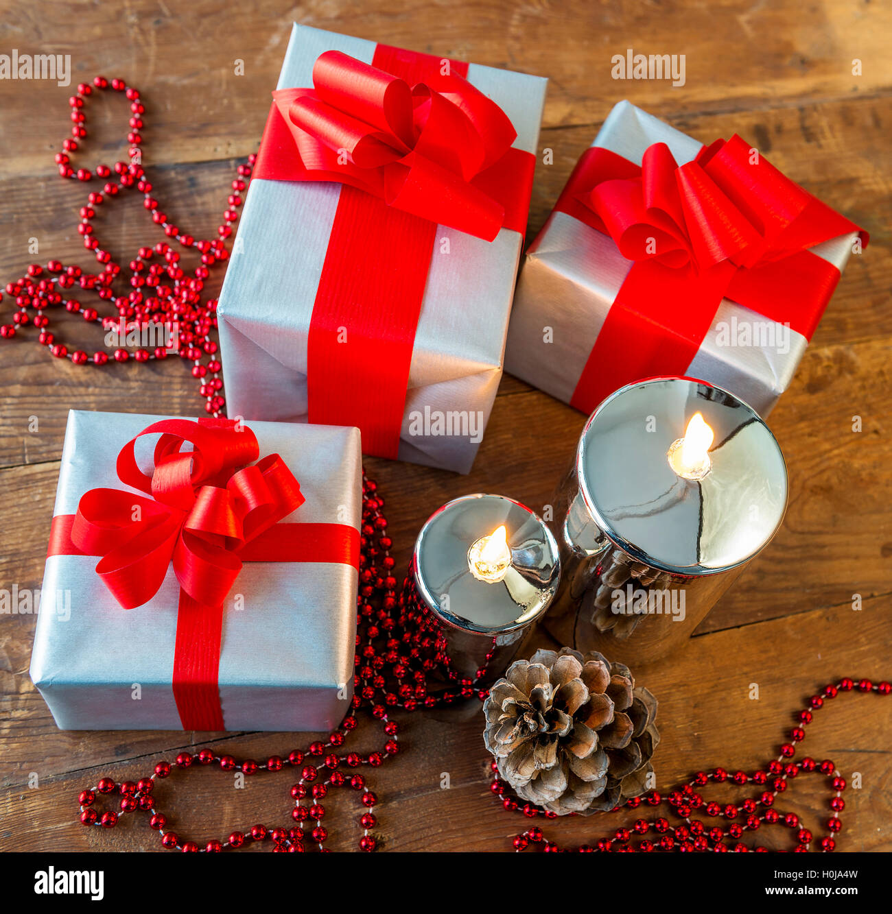 gift boses and candles for christmas Stock Photo