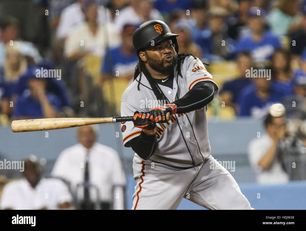 Los Angeles, California, USA. 20th Sep, 2016. San Francisco Giants catcher Johnny Cueto hits the ball against Los Angeles Dodgers during a baseball game on Tuesday, Sept. 20, 2016, in Los Angeles. © Ringo Chiu/ZUMA Wire/Alamy Live News Stock Photo