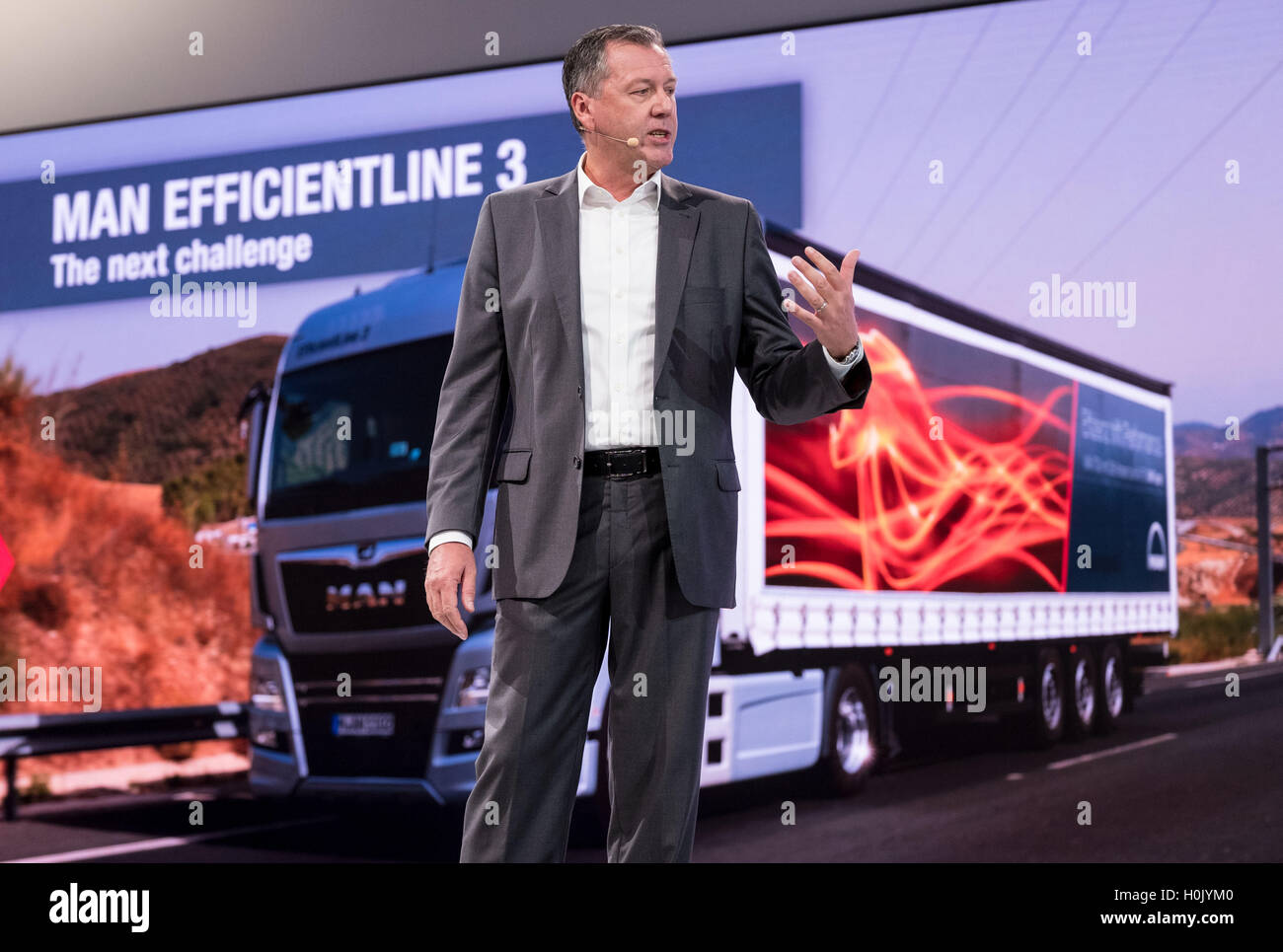 Hanover, Germany. 21st Sep, 2016. MAN marketing director Heinz-Juergen Loew speaks at the MAN stand at the 66th IAA Commerical Vehicles trade fair in Hanover, Germany, 21 September 2016. Around 2,000 exhibitors from 52 countries are presenting alternative engines, autonomous cars, and networked vehicles from 22 to 29 September at the leading trade fair for commercial vehicles. Photo: PETER STEFFEN/dpa/Alamy Live News Stock Photo