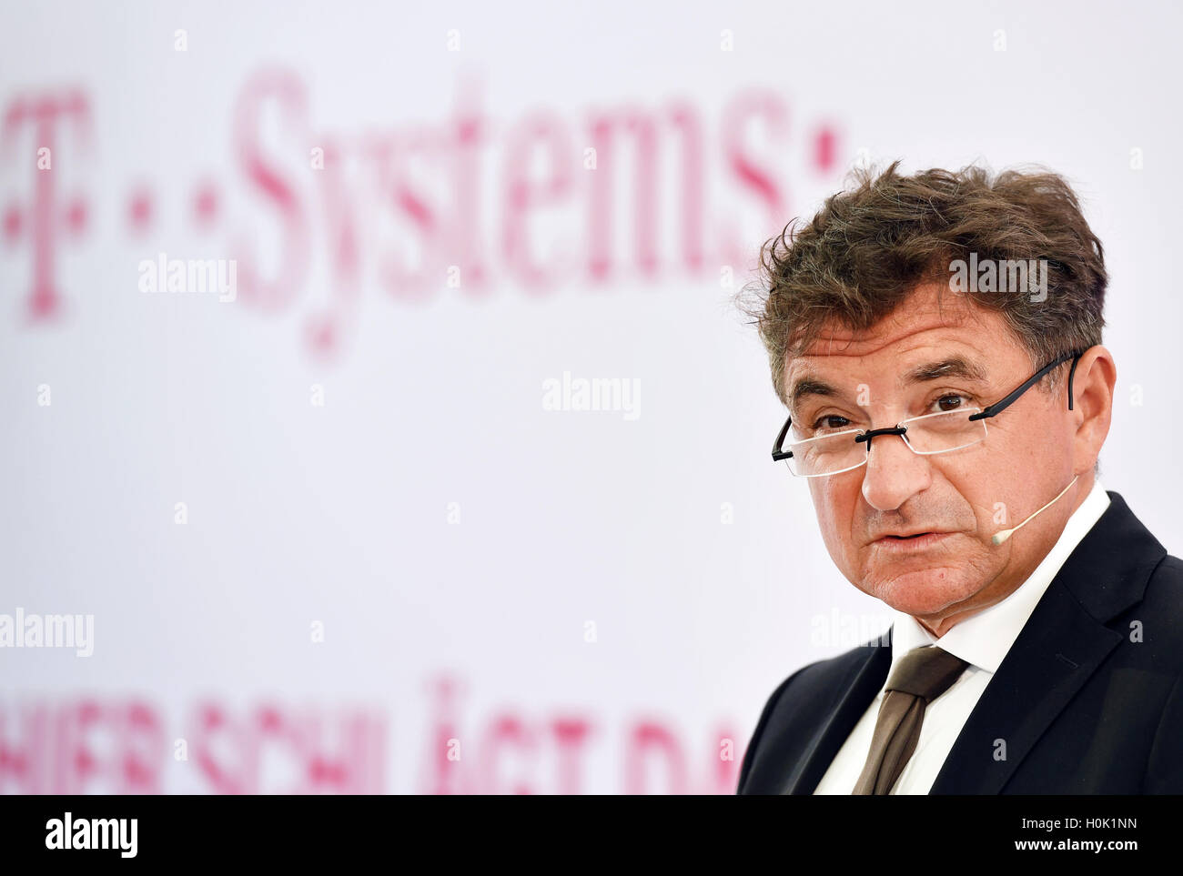 Biere, Germany. 12th Sep, 2016. Dr. Ferri Abolhassan, CEO of T-Systems, responsible for IT Division and Telekom Security, speaks at the laying of the first stone for the expansion of the Cloud-Rechenzentrum of Deutsche Telekom in Biere, Germany, 12 September 2016. Photo: Jens Kalaene/dpa/Alamy Live News Stock Photo