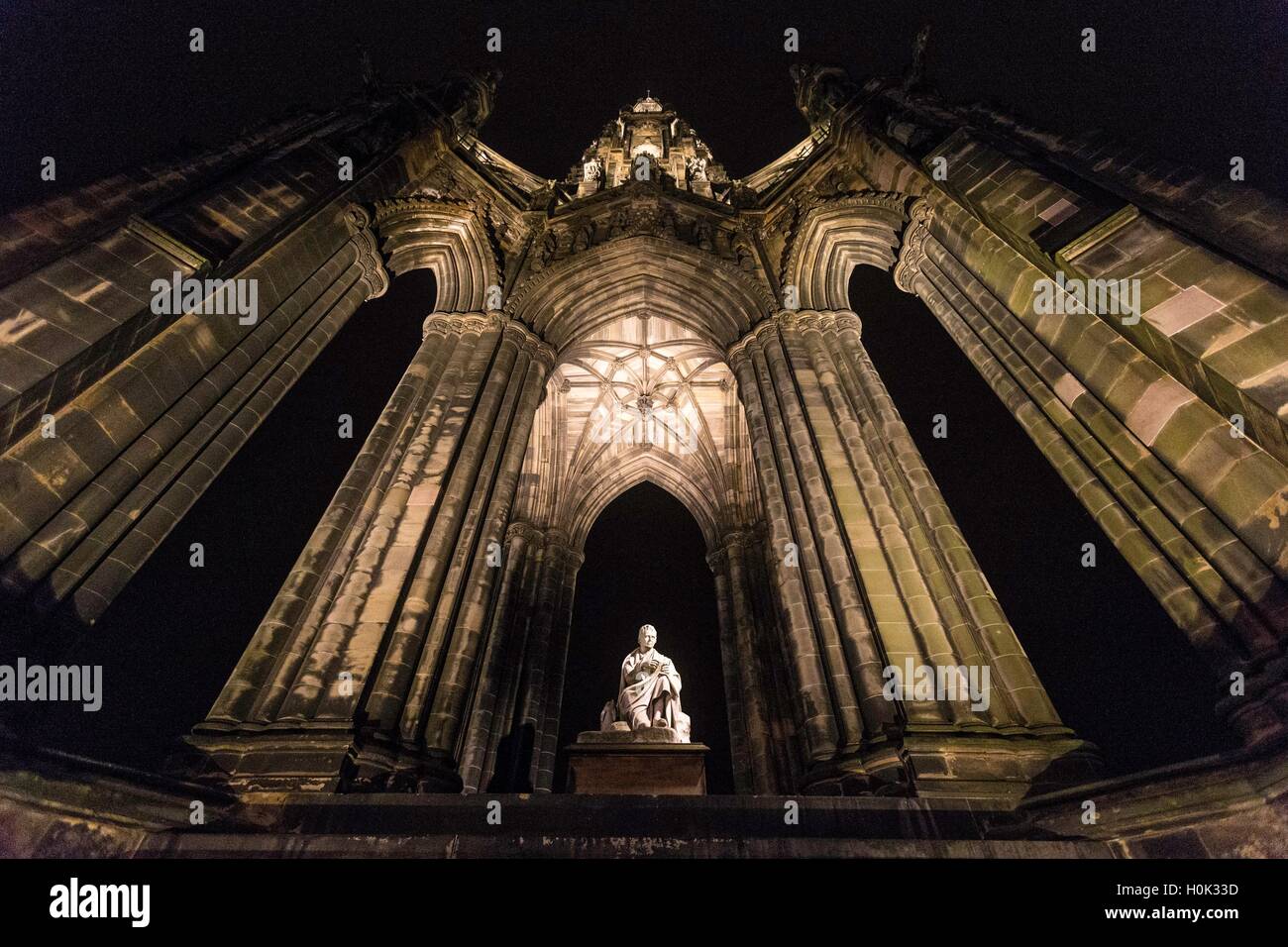 Edinburgh, Scotland, UK. 22nd September, 2016. To commemorate the anniversary of the death of Sir Walter Scott, the famous Scott Monument on Edinburgh's Princes Street has been relit following a refit of the lighting.  The structure has been floodlit in previous years but the new LED system - designed by KSLD - is the first bespoke lighting to be installed. The state-of-the-art design highlights the Monument's intricate architectural features with a soft warm glow, allowing the landmark to shine as part of Edinburgh's night skyline. Credit:  Richard Dyson/Alamy Live News Stock Photo