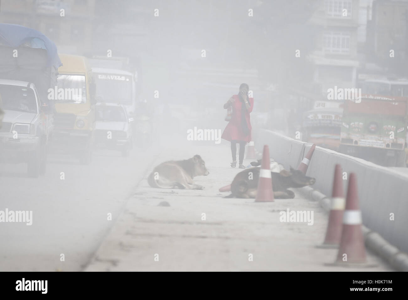 Kathmandu, Nepal. 22nd Sep, 2016. A Nepalese woman covers her face to