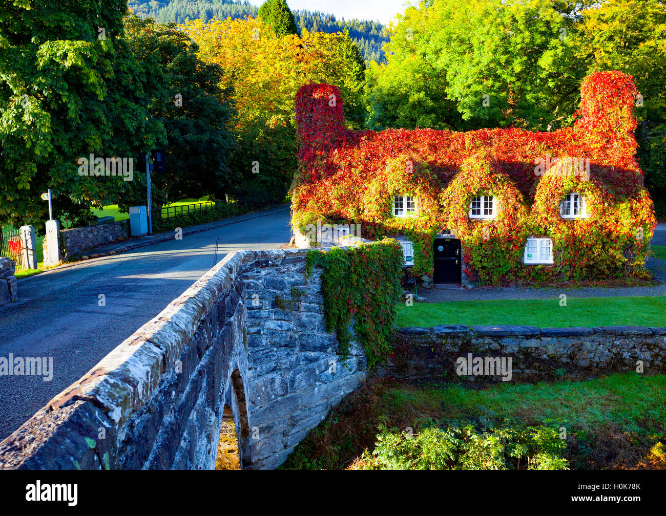 Llanrwst, Conwy, Wales, UK  The sunrise bathes Tu Hwnt I’r Bont Tearoom on the day of the Autumn Equinox. Stock Photo