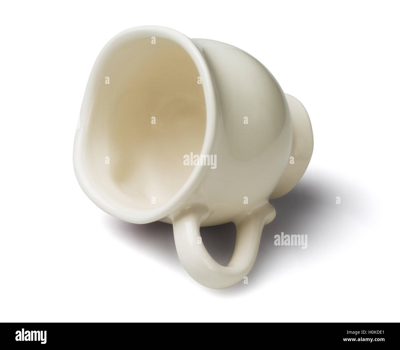 Empty Porcelain Tea Cup Lying on White Background Stock Photo