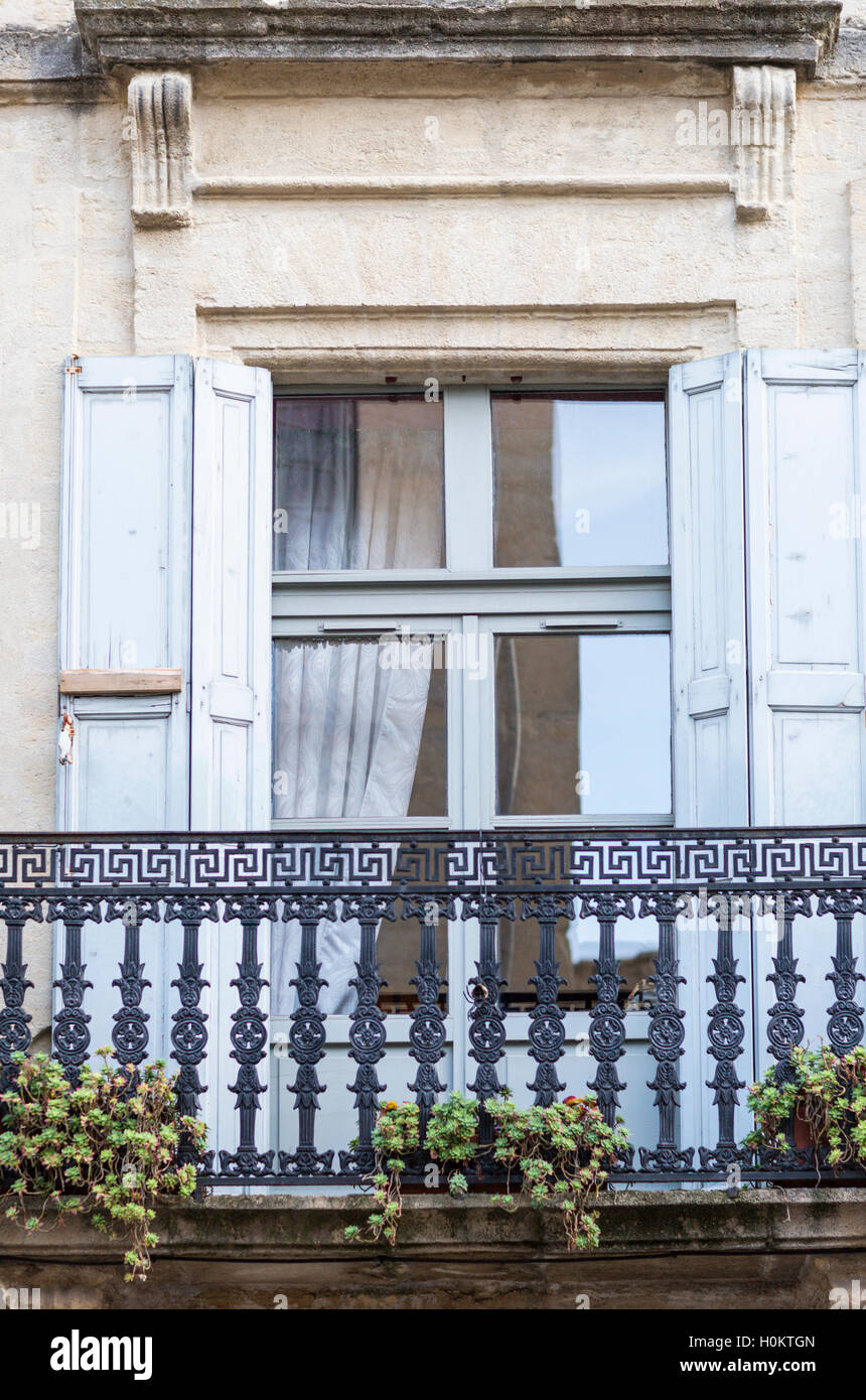 Window and balcony, Uzes, Languedoc, France Stock Photo