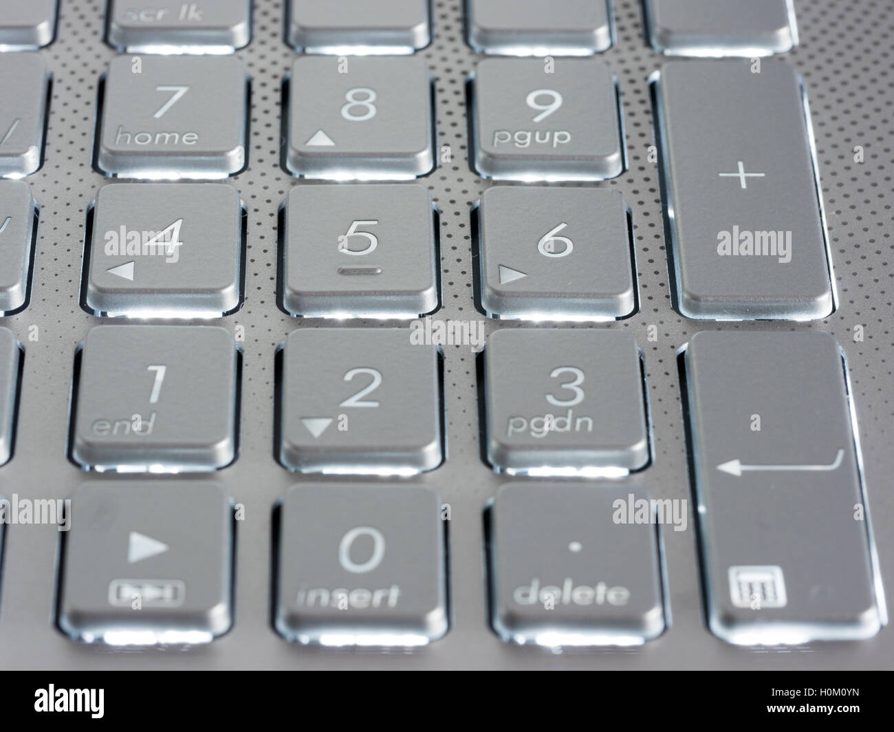 Number keys on silver keyboard of laptop Stock Photo