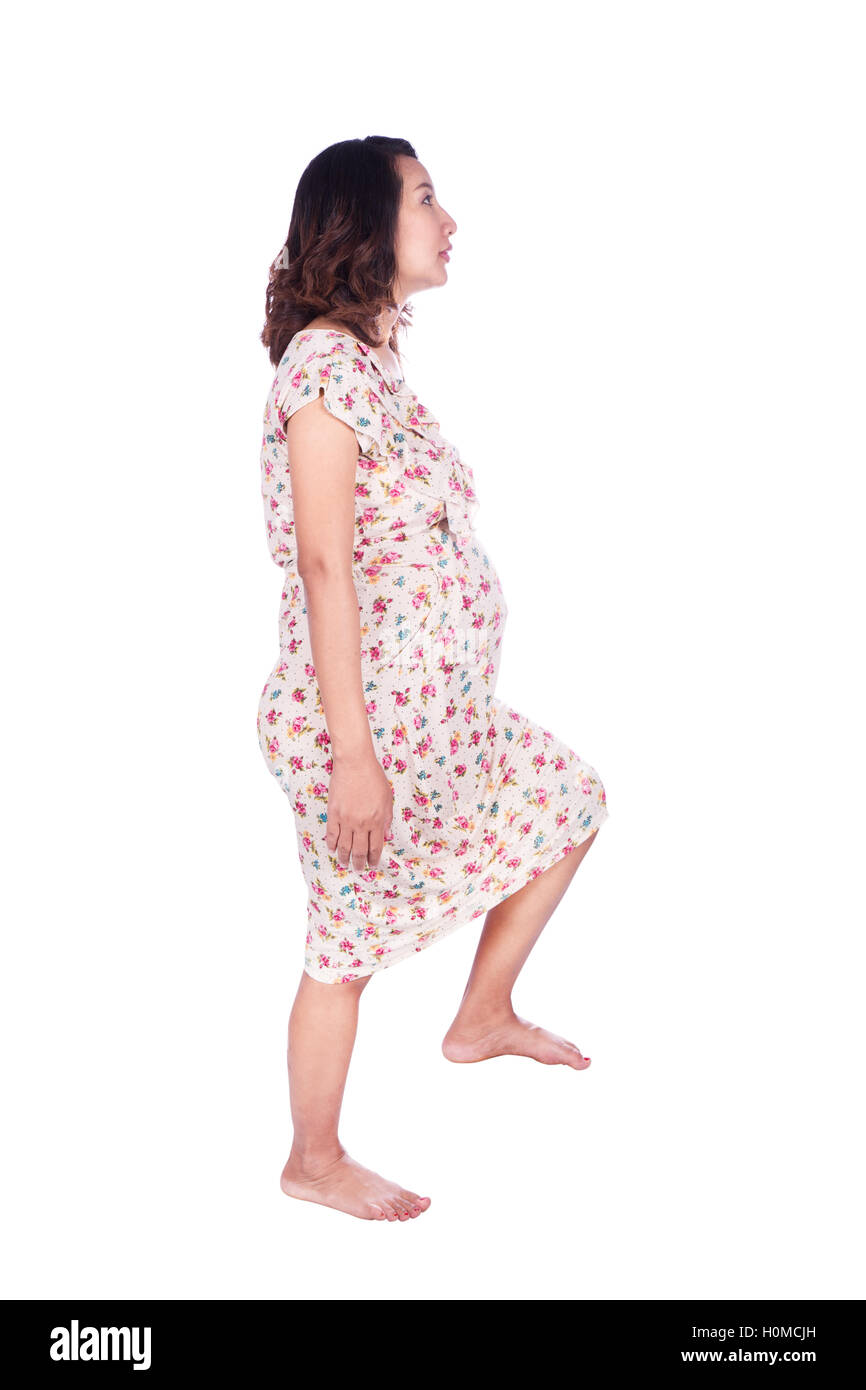 Pregnant woman standing on stairs Cut Out Stock Images & Pictures Alamy