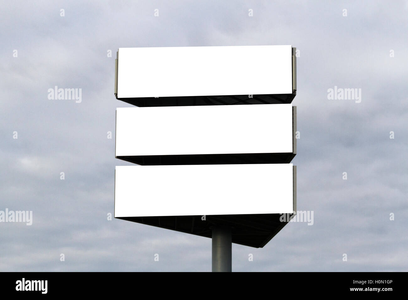 Mock up. Outdoor advertising, blank billboard outdoors, public information board on city road Stock Photo