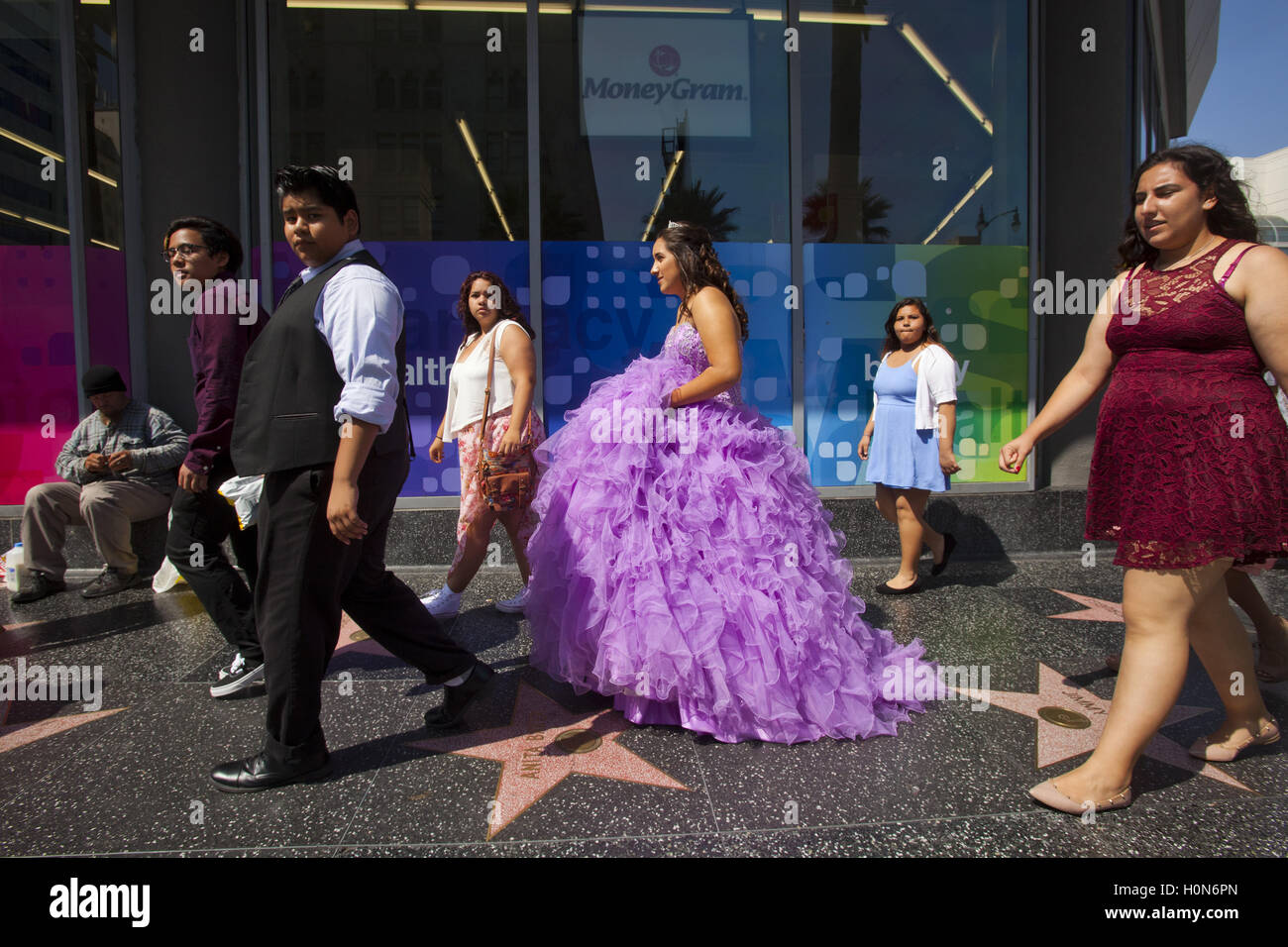 Girl in quinceanera dress on Hollywood Boulevard, Hollywood, Los