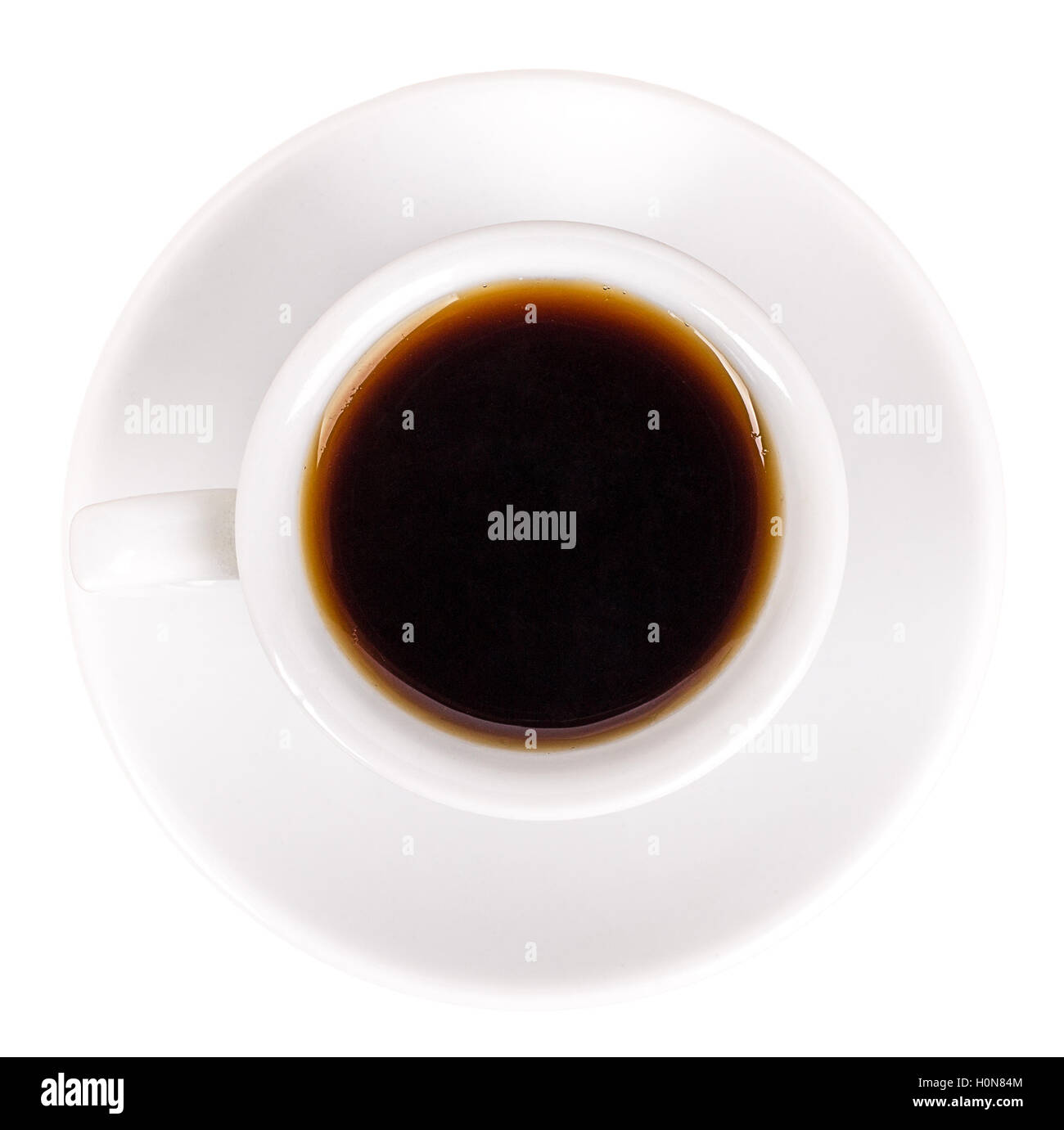 white cup and saucer with coffee top view isolated on white background ...