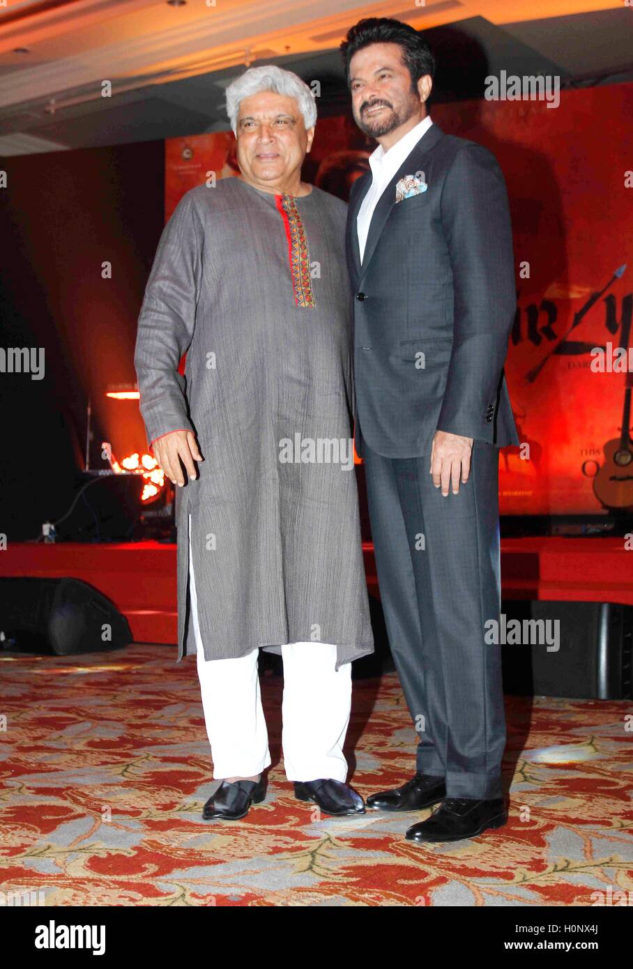 Bollywood lyricist Javed Akhtar with actor Anil Kapoor during the music launch of film Mirzya in Mumbai, India Stock Photo