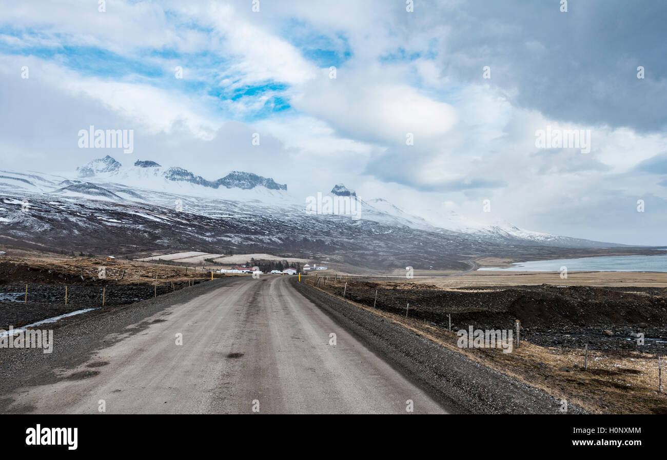 Road through volcanic landscape, ring road, National Highway 1 or Hringvegur, near Djúpivogur, East Island, Island Stock Photo