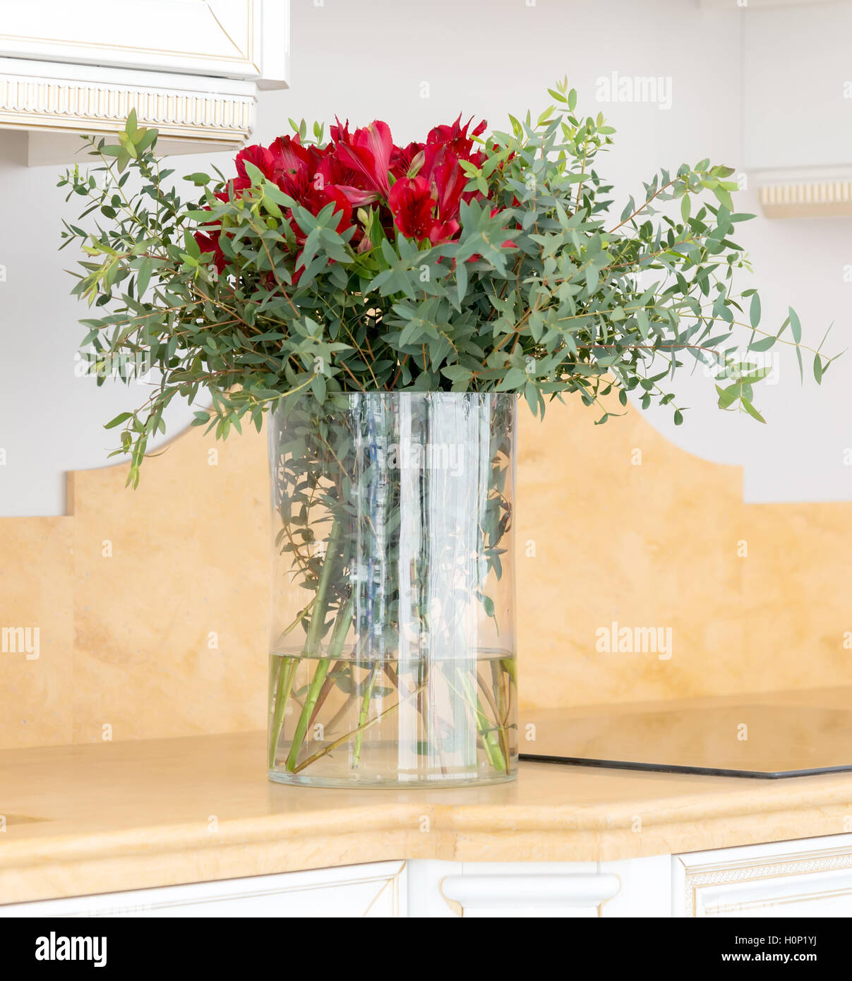 the beautiful flower arrangement in clear glass vase Stock Photo