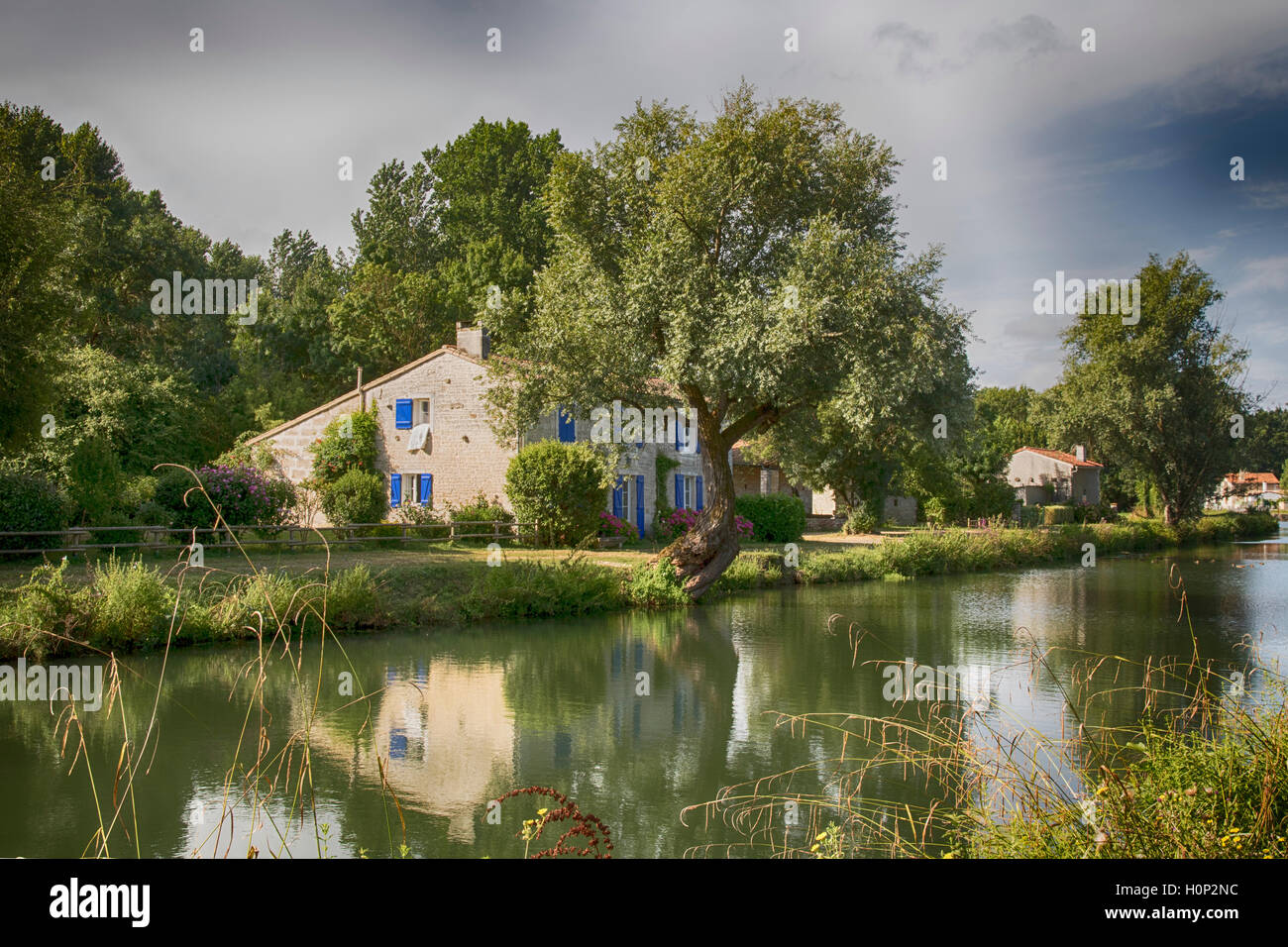 Riverside House on the River Sevre near Coulon, central France Stock Photo