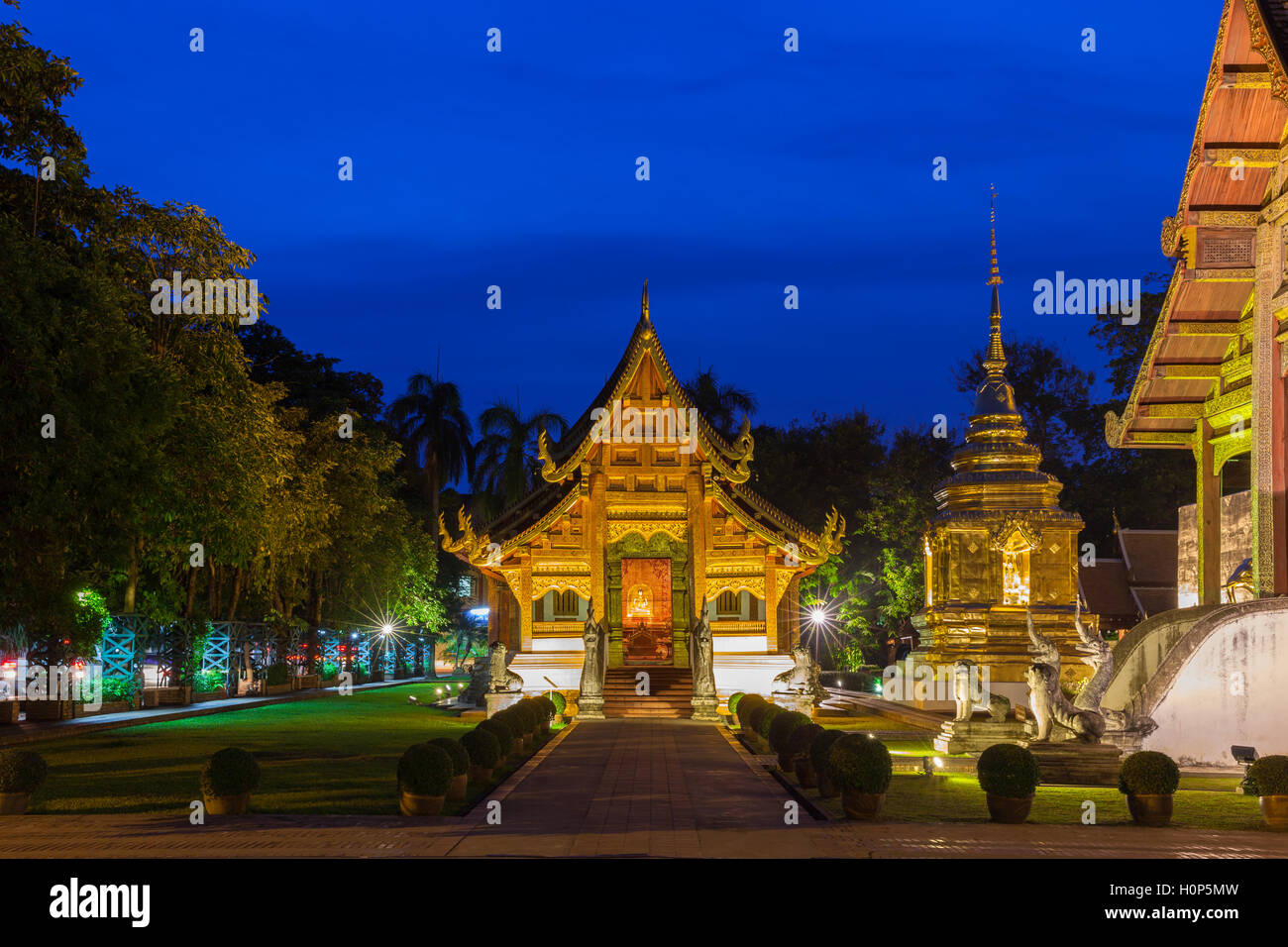 Dusk View of the Wat Phra Singh temple, the most revered temple in Chiang Mai, Thailand. Stock Photo