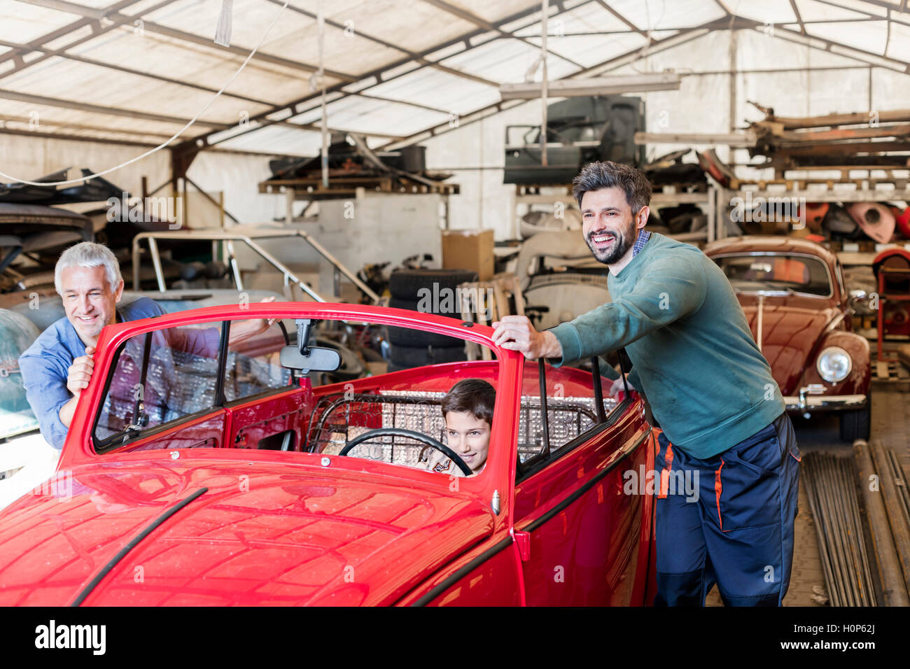 Vintage men working on car hires stock photography and images Alamy