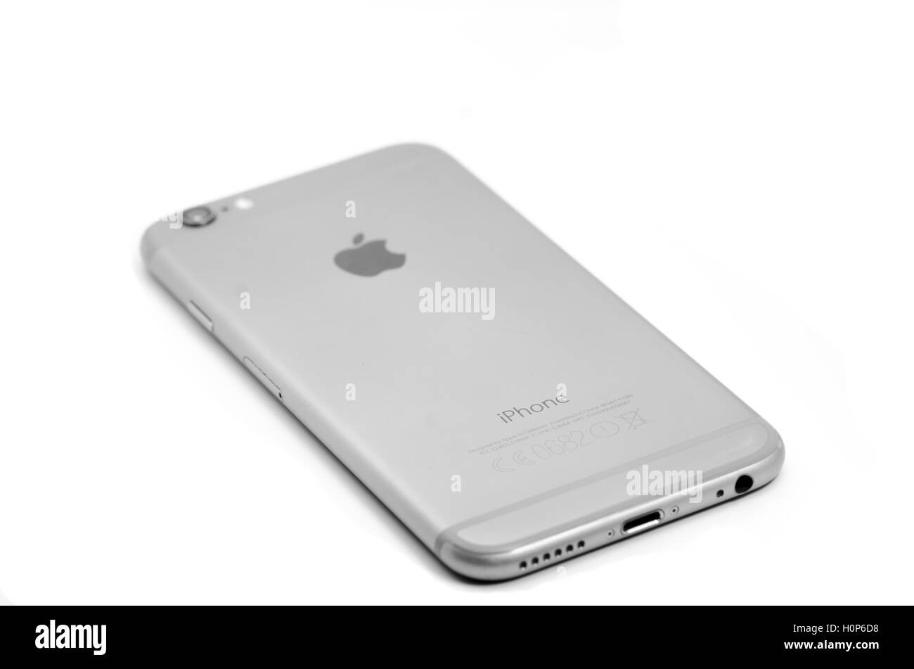ROMANIA -SEPTEMBER 20, 2016. Back of iPhone 6 Space Grey color with jack 3.5mm lay down isolated on white Stock Photo