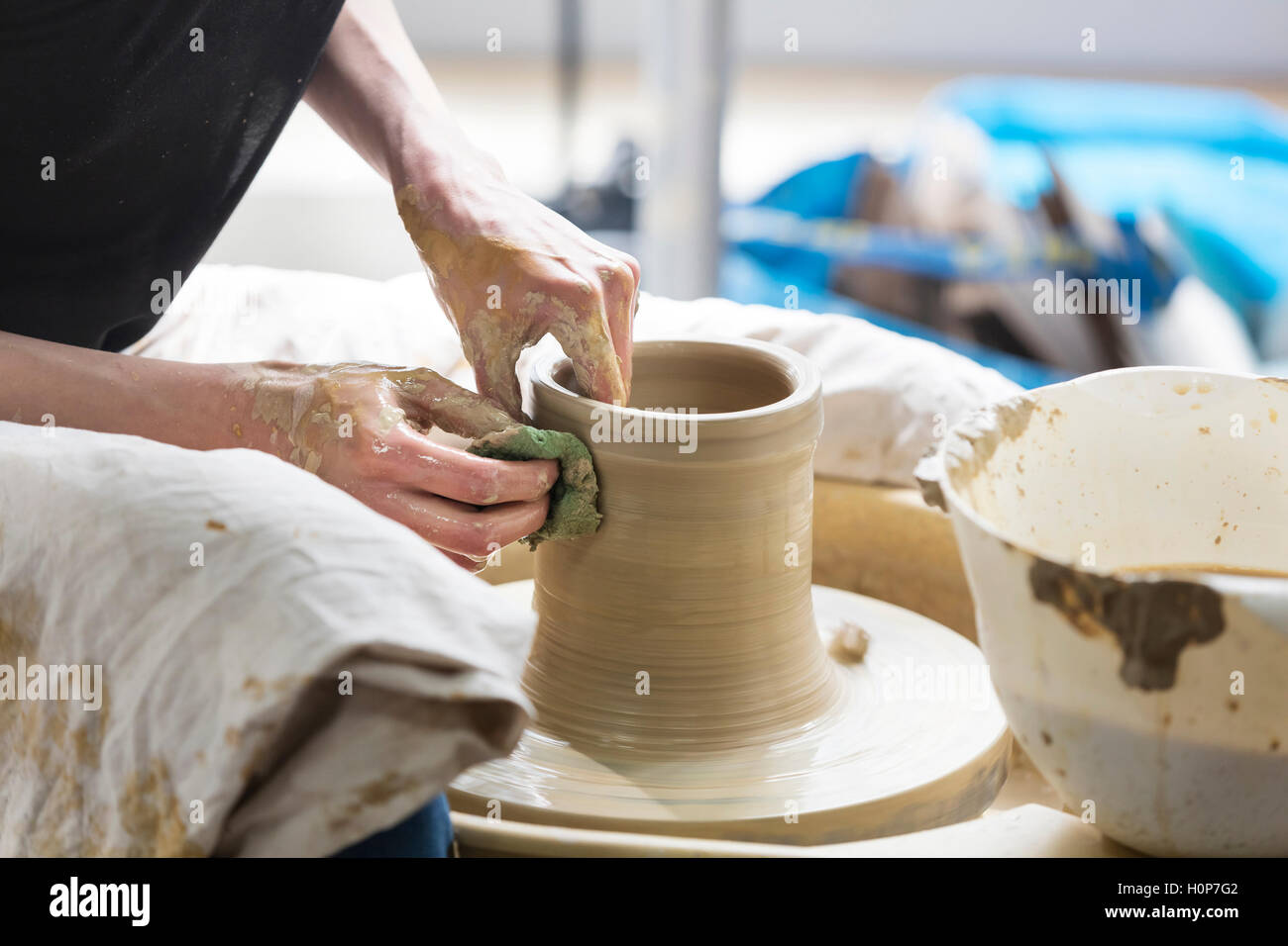 woman using pottery wheel studio Stock Photo Alamy