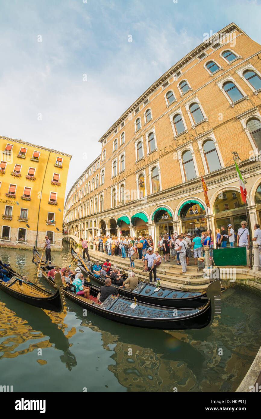 People waiting for a gondola ride in Venice, Italy Stock Photo