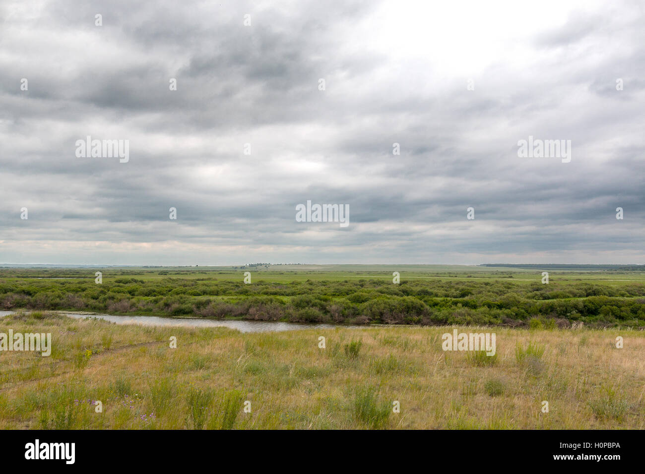 the high hill on the steppes of the river Stock Photo