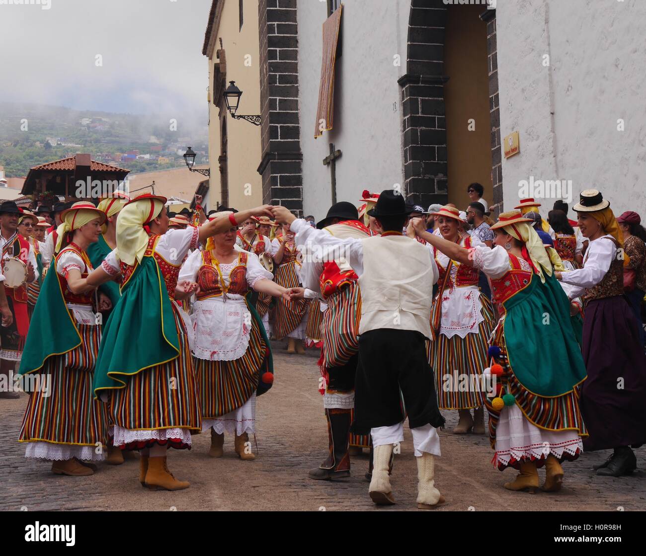 People in regional costumes dancing at Romería de San Isidro Labrador,a festival to celebrate country traditions, La Orotava, Tenerife, Canary Islands Stock Photo