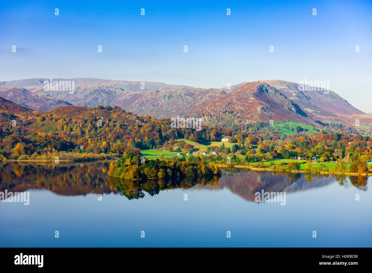 Grasmere lake with Helm Crag and Seat Sandal beyond. Lake District National Park. Cumbria. England. Stock Photo