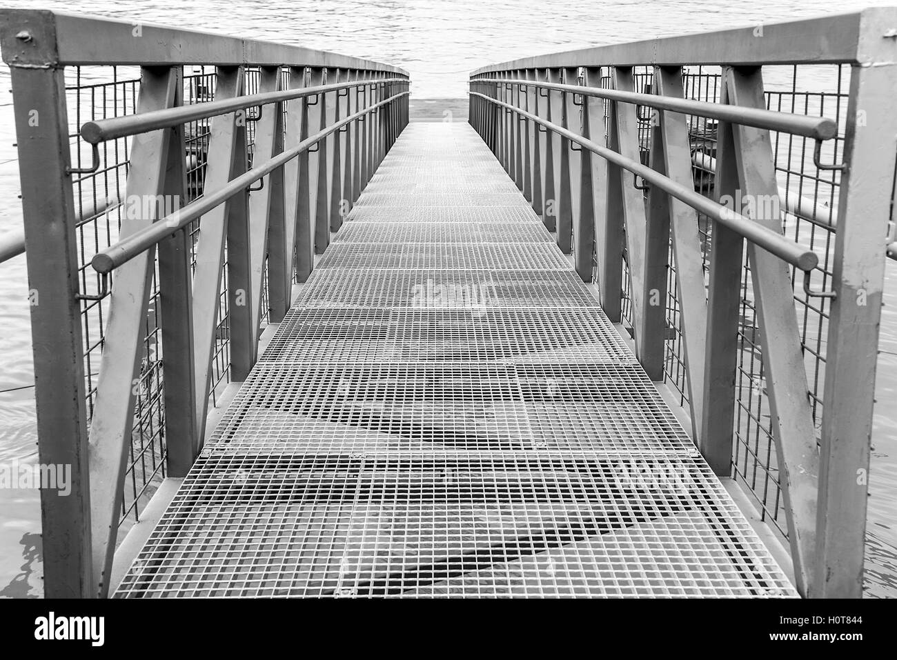 Bridge or pier built of steel structures. Stock Photo