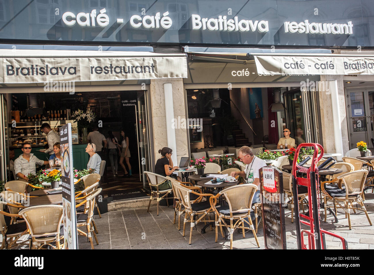 Bratislava Tourists in the Cafe Cafe restaurant, Rybarska brana street, Bratislava Old Town, Slovakia, Europe Stock Photo