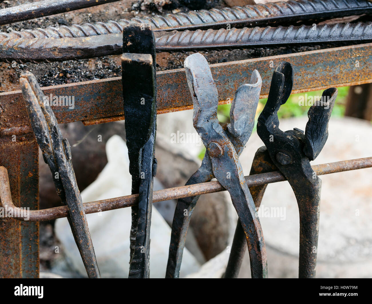 Forge Tongs In Country Outdoor Blacksmith On Backyard Stock Photo