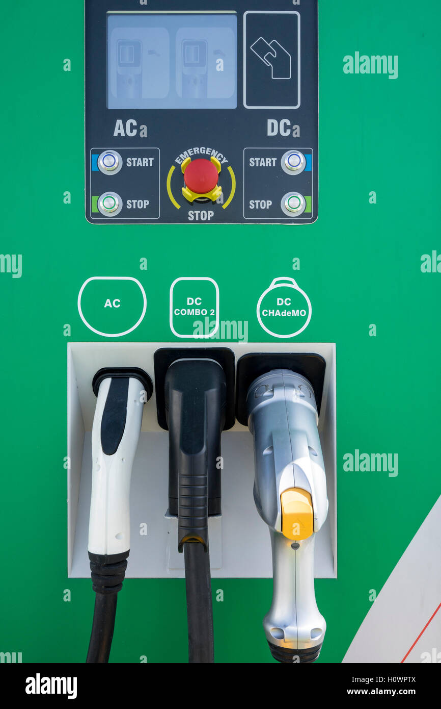 detail of electric car recharging facility with various types  of connectors and voltages. Stock Photo