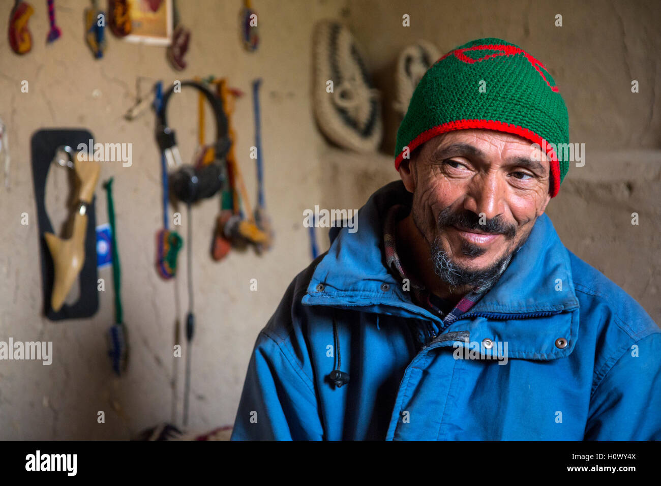 Dades Gorge, Morocco.  Middle-aged Berber Man in his Living Room. Stock Photo