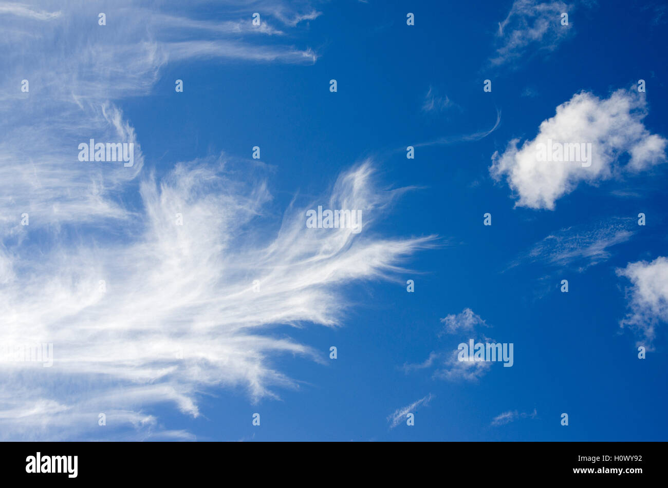 Beautiful blue sky with wispy clouds, summer sky. Beautiful clouds