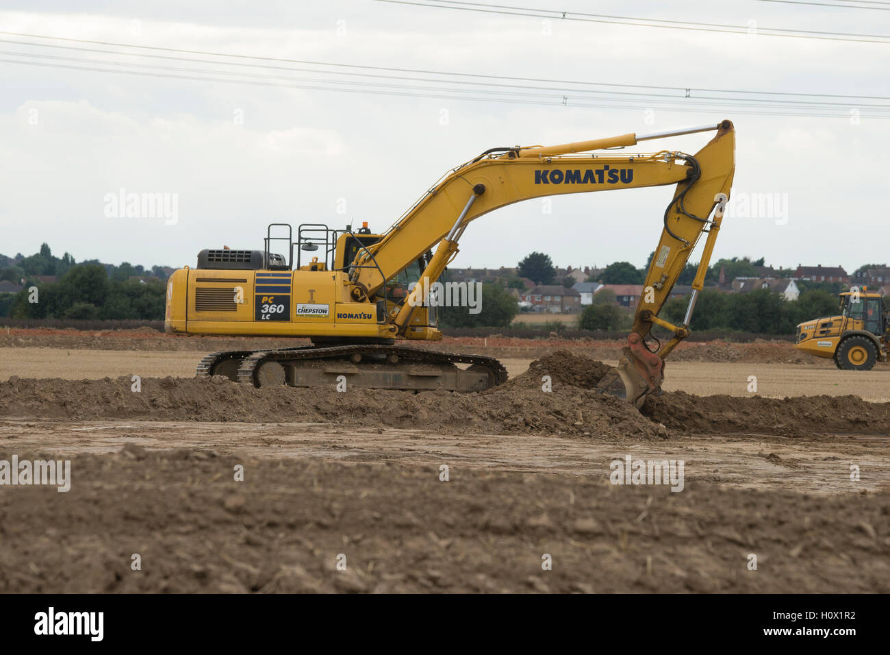 Phase one of new transformation in a small countryside village called hoo in kent. Miners come to mine the local farm fields for their REM resources Stock Photo