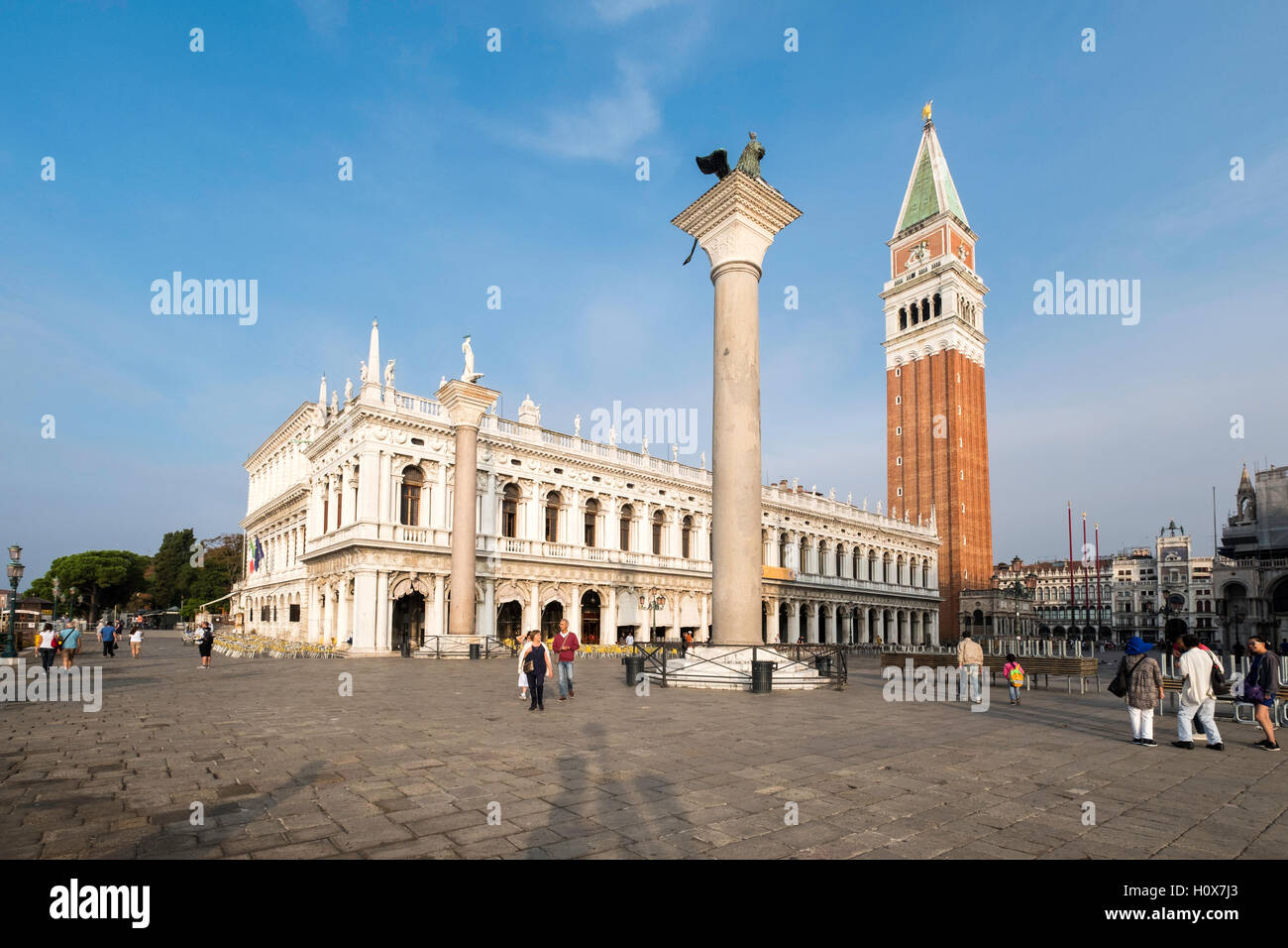 St Mark's Square, Piazza San Marco, Venice, early in morning with campanile and columns of San Marco & San Teodoro. Italy Stock Photo