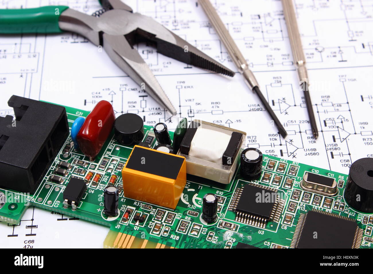 Printed circuit board with electrical components and precision tools ...
