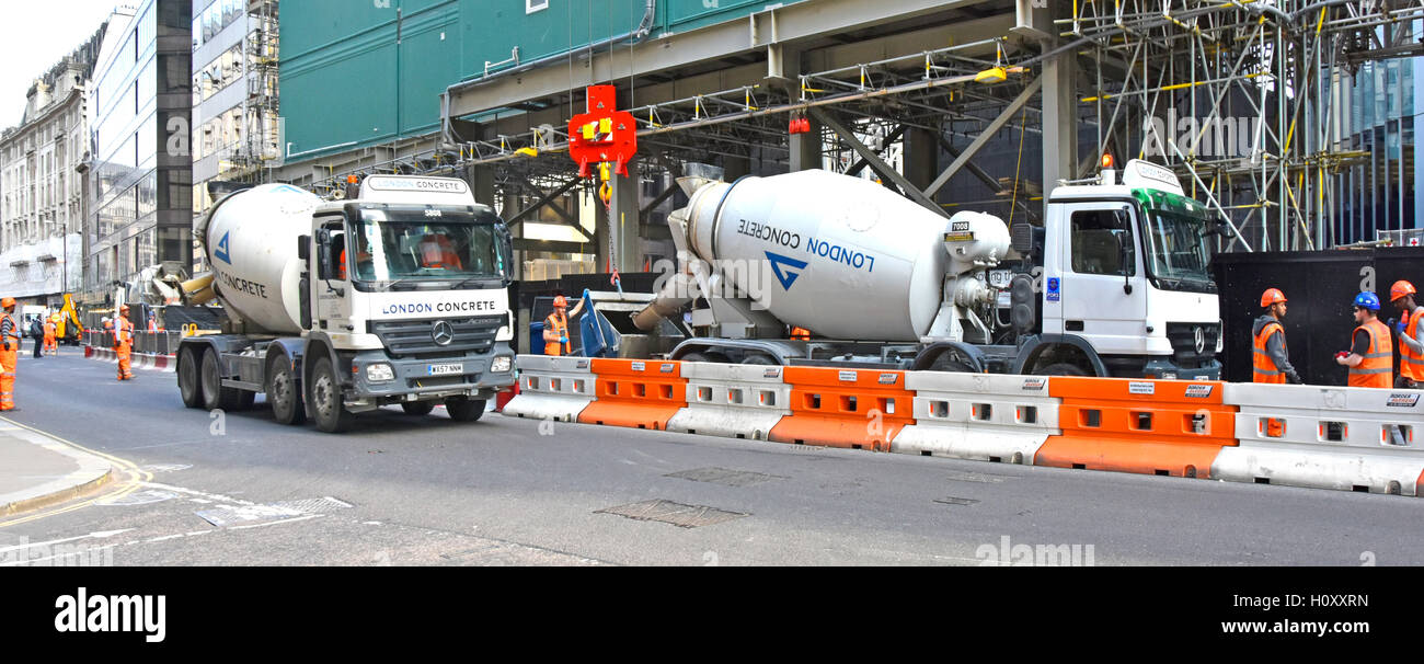 Ready mixed cement concrete truck City of London street partly