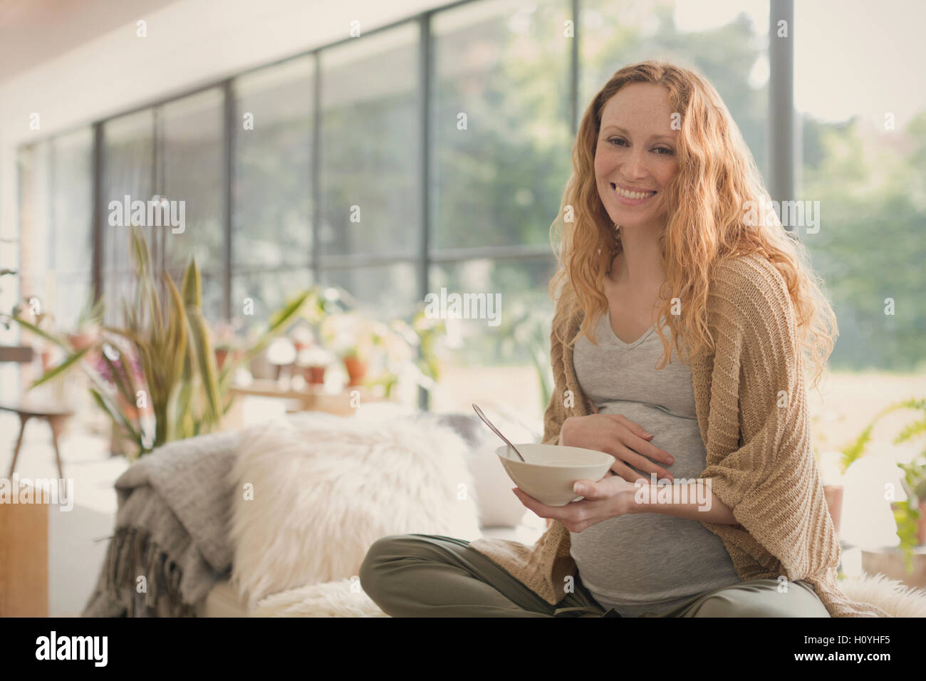 portrait pregnancy woman eating ice cream Stock Photo Alamy