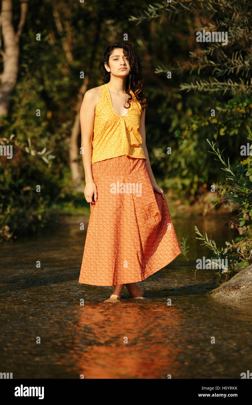 A Beautiful Young Hispanic Woman Fashion Model With Natural Hair