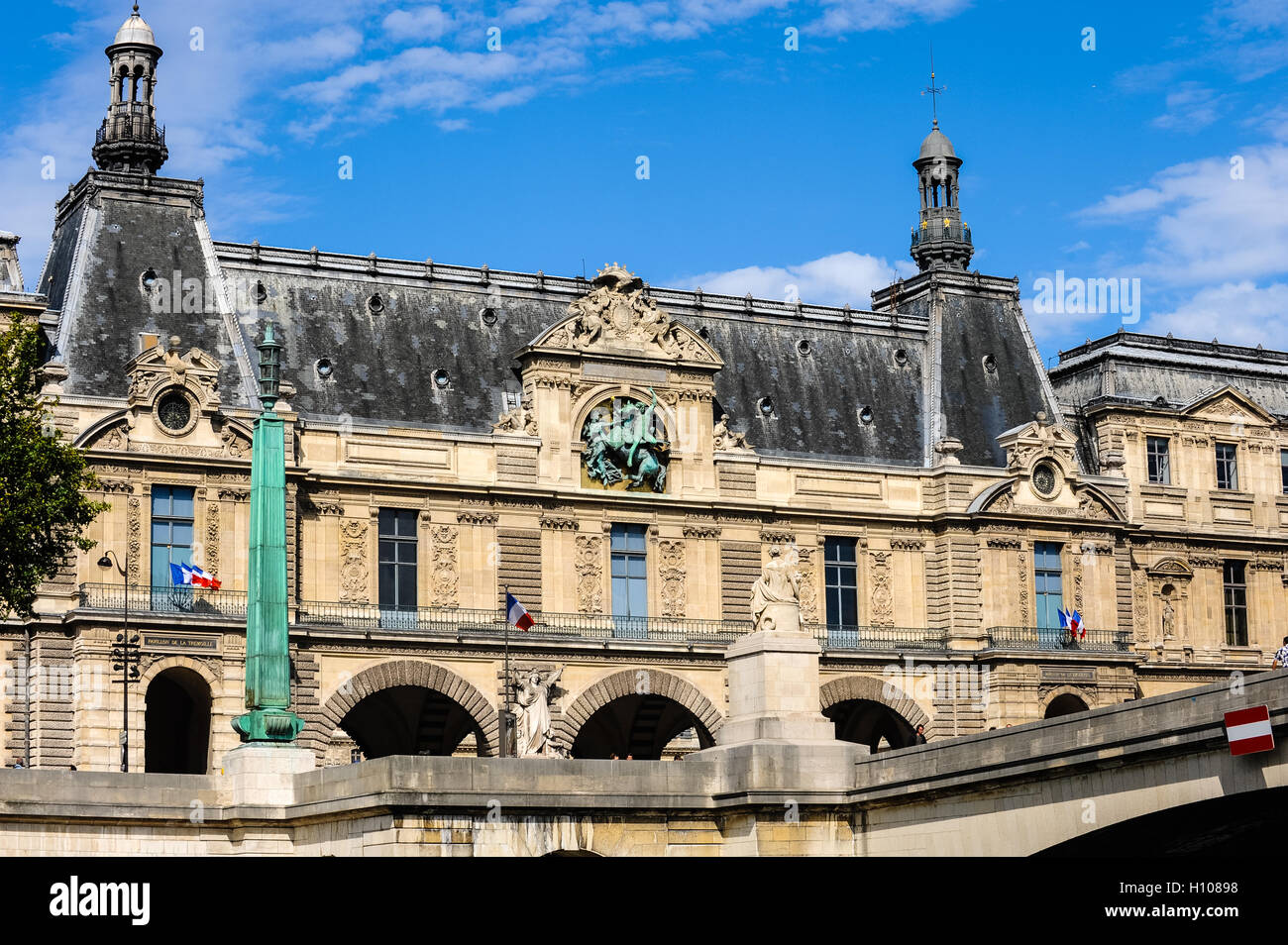 Paris, France. View from a boat on the river Seine. The Louvre is one of the world's largest museums. Stock Photo