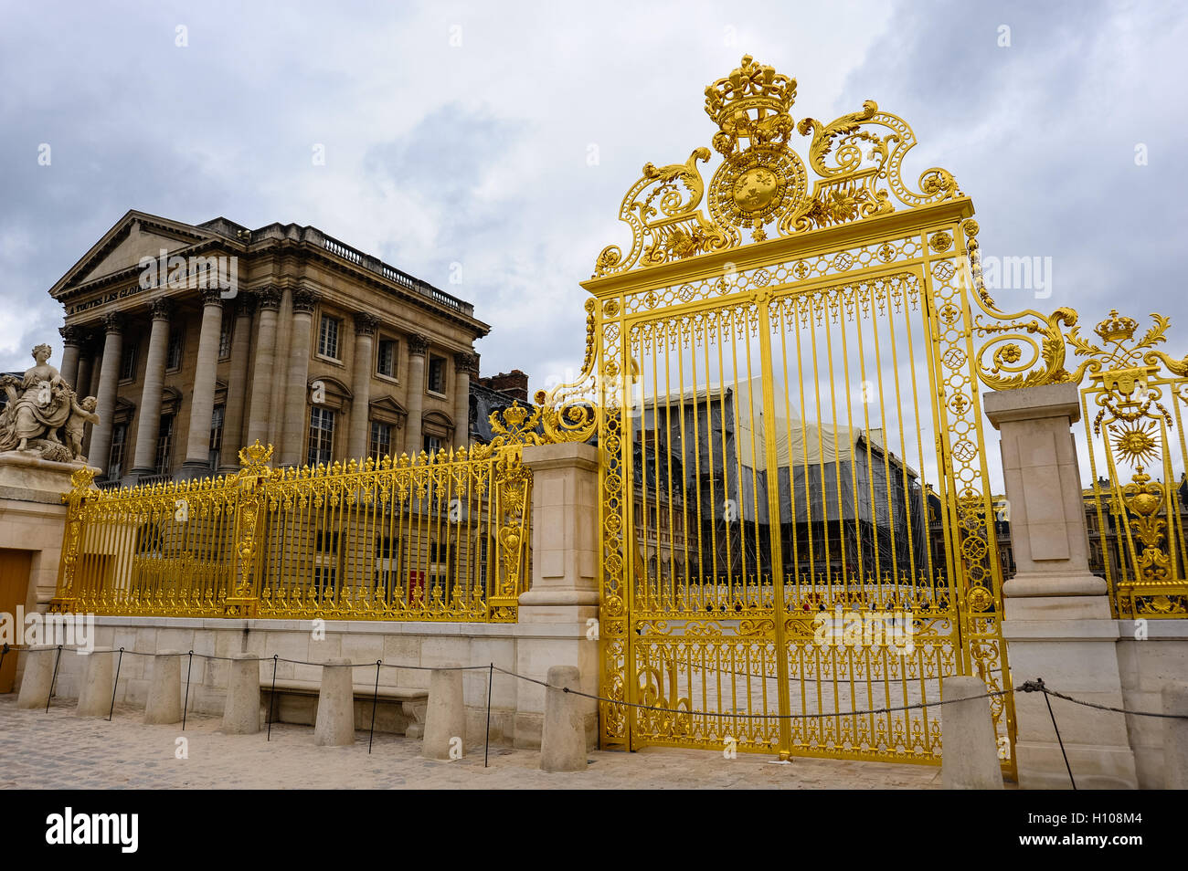 The Palace of Versailles, or simply Versailles, is a royal château close to Paris, France. Pavillon Gabriel in the background. Stock Photo