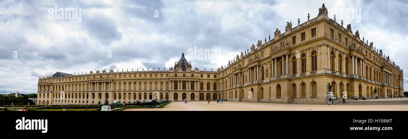 The Palace of Versailles, or simply Versailles, is a royal château close to Paris, France. Stitched panorama. Stock Photo