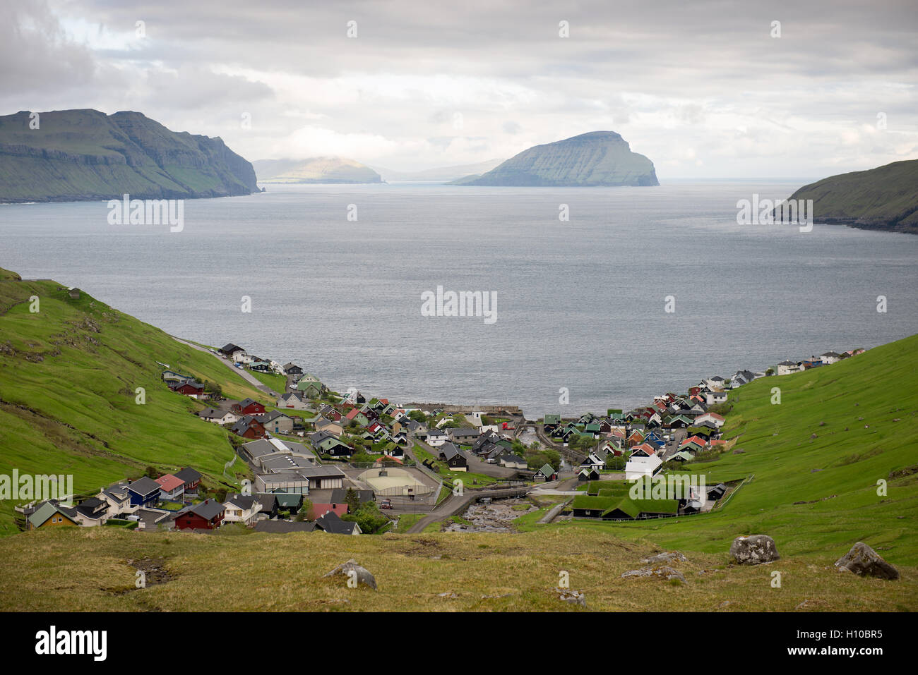 Kvivik on the Faroe Islands with the island Koltur in the background Stock Photo