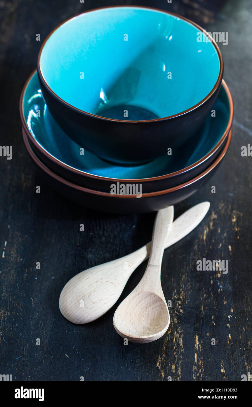 Rustic table setting with vintage plates and silverware Stock Photo - Alamy