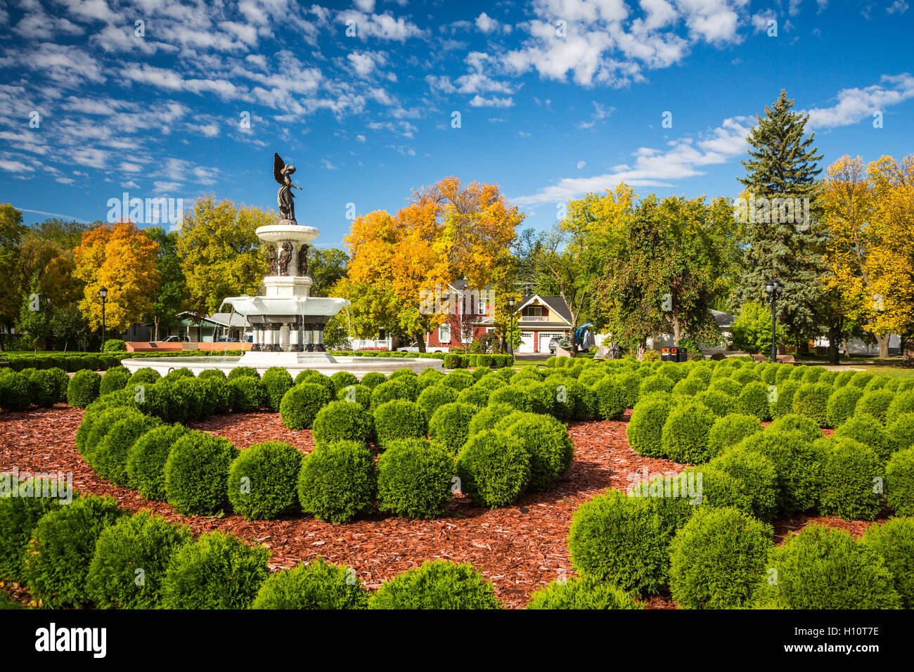 Angel of the Waters fountain in autumn in Bethel Heritage Park, Winkler