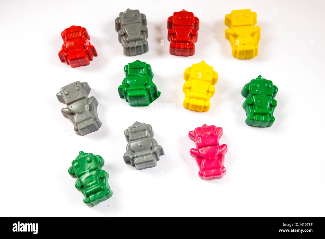 Colourful Robot crayons in unusual shapes. Stock Photo
